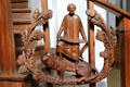 Modern pulpit carving of Evangelist St Mark with lion symbol at Heilig-Geist-Kirche. Munich, Germany.