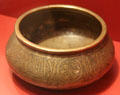 Muslim engraved brass basin from Syria or Egypt at Five Continents Museum. Munich, Germany.