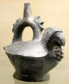 Moche culture ceramic stirrup vessel in shape of parrot with throat pouch from north coast of Peru at Five Continents Museum. Munich, Germany.