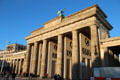Brandenburg Gate seen obliquely showing carvings between columns. Berlin, Germany.