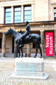 Amazon riding Horse sculpture by Louis Tuaillon outside Neues Museum. Berlin, Germany.
