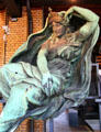 Night bronze sculpture by Ludwig Brunow from Anhalter Rail Station at German Museum of Technology. Berlin, Germany.