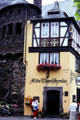 Historic half-timbered building with flood high water line above door. Cochem, Germany.