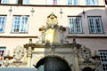 Detail of sandstone Baroque entrance arch for Füchtings Courtyard. Lübeck, Germany.