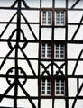 Intricate patterns of half timbers on wall of house. Monschau, Germany.