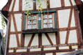 Half-timbered building with phrase in German Gothic script on facade. Bacharach, Germany.