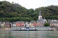Sightseeing boat traveling past St. Goar. St. Goar, Germany.