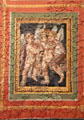 1. Roman ceiling fresco section depicting pair of dancing cupids with horn of plenty at Cathedral Museum. Trier, Germany.