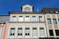 Neoclassical building with ornate roof dormer on Simeonstr. Trier, Germany.