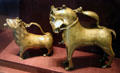 Aquamaniles in form small lion from North Germany & large horse with glass eyes made in Nuremberg at Bavarian National Museum. Munich, Germany.