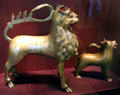 Aquamaniles in form large lion from Nuremberg & small lion made in North Germany at Bavarian National Museum. Munich, Germany.