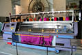 Computer controlled flat knitting machine produces sweater parts every six minutes which then need to be sewn together at Deutsches Museum. Munich, Germany.