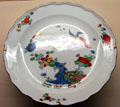 Meissen porcelain plate with phoenix & peonies at Meissen porcelain museum at Lustheim Palace. Munich, Germany.