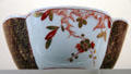 Meissen porcelain quatrefoil bowl with gold net ornaments & flower branches based on Chinese model at Meissen porcelain museum at Lustheim Palace. Munich, Germany.