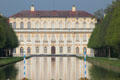 New Schleißheim Palace reflected in central canal. Munich, Germany.