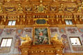 Ornate gilded ceiling & with mythological painting set into door pediment in Goldener Saal at Augsburg Rathaus. Augsburg, Germany.
