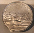 Medallion marking Bamberg canal opening by F. Rabausch & J.J. Neuss of Augsburg at Bamberg City Museum. Bamberg, Germany.