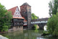 Half timber building beside Water Tower over Pegnitz River. Nuremberg, Germany.