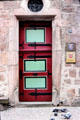 Detail of door on stone house with Marburg coat of arms along side on marketplace. Marburg, Germany.