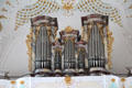 Gilded decorative work surrounding organ pipes at Liebfrauenkirche. Günzburg, Germany.
