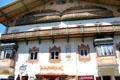 Traditional building with carved wooden balconies, painted designs and oriel windows. Mittenwald, Germany.
