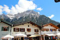 Main street with Alps foothills in the background. Mittenwald, Germany.