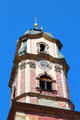 Clock tower of Church of Sts Peter & Paul. Mittenwald, Germany.