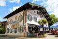 Fresco on Hotel Alte Post related to trade route between Augsburg & Venice. Oberammergau, Germany.