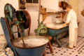 Model bakery working area including working table, dough dividing machine & dough kneading machine at Museum of Bread and Art. Ulm, Germany.