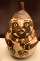 Nazca culture ceramic stirrup-spout bottle showing carrier of goods from Peru at Museum of America. Madrid, Spain.