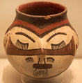 Nazca culture ceramic global vessel with trophy face from Peru at Museum of America. Madrid, Spain.