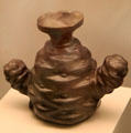 Chimu culture ceramic bottle in form of potato which originated in the Andes from Peru at Museum of America. Madrid, Spain.