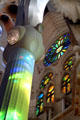 Stained glass cast color on columns at Sagrada Familia. Barcelona, Spain.