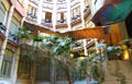 Staircase crosses central courtyard of Casa Milà. Barcelona, Spain.