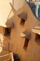 Central courtyard well windows seen from roof of Casa Milà. Barcelona, Spain.