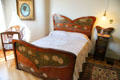 Art Nouveau bedroom in museum apartment at Casa Milà. Barcelona, Spain.