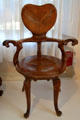 Modernista armchair designed for Casa Calvet in Barcelona by Antoni Gaudí at Gaudi House Museum in Parc Güell. Barcelona, Spain.
