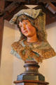 Bust on corner fireplace designed for Casa Vicens in Alella by Antoni Gaudí at Gaudi House Museum in Parc Güell. Barcelona, Spain.