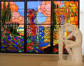 Stained glass window by Francesc Labarta & statue of woman by Jaume Otero at Museu Nacional d'Art de Catalunya. Barcelona, Spain.