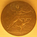 Medal showing figure of victory from Universal Exposition of Paris by Jules-Clément Chaplain at Museu Nacional d'Art de Catalunya. Barcelona, Spain.