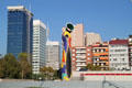 Parc de Joan Miró ringed by modern buildings near Plaça d'Espanya. Barcelona, Spain.