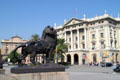 Columbus Monument lion & Gobierno Militar on Passeig de Colom. Barcelona, Spain.