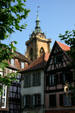 Half-timbered houses & tower of St Martin church. Colmar, France.