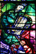 Detail of King David playing harp from stained-glass by Marc Chagall in Cathedral. Metz, France.