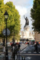 Place de la République monument at end of city street. Paris, France.