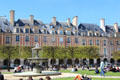 Place des Vosges fountain by Cortot. Paris, France.