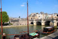 Western tip of Île de la Cité with equestrian statue of Henri IV & Pont Neuf. Paris, France.