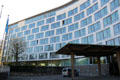 Window array of curved facade at UNESCO Headquarters. Paris, France.