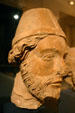 Sculpted head of a Pope from rubble of Cathedral destroyed in WWI now in Tau Palace. Reims, France.