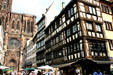 Half-timbered buildings on rue Mercier leading to Cathedral. Strasbourg, France.